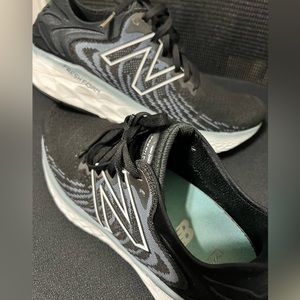 New balance 10N. Like new  black with blue trim